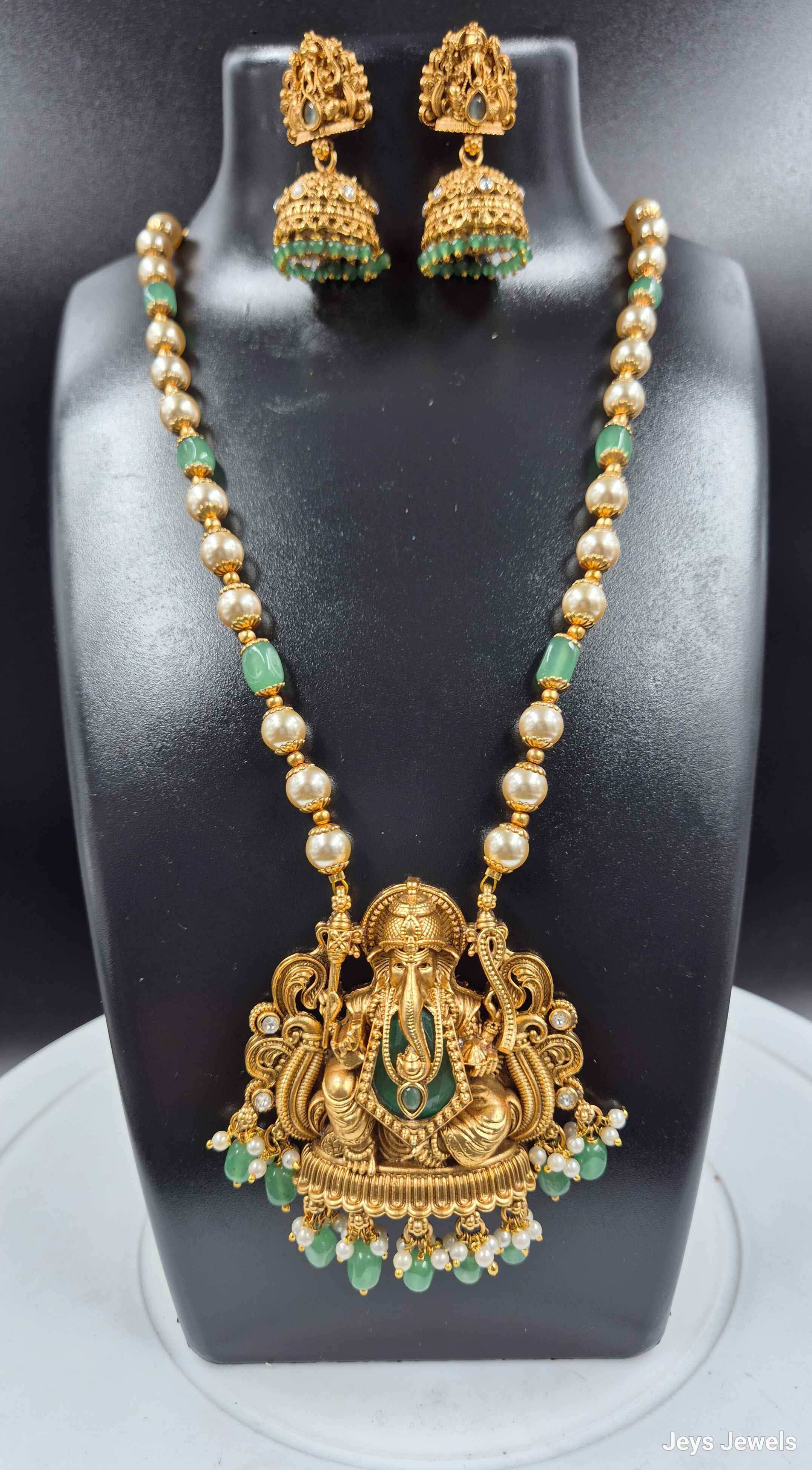 Antique Gold Ganesha Necklace with Green Beads & Jhumkas