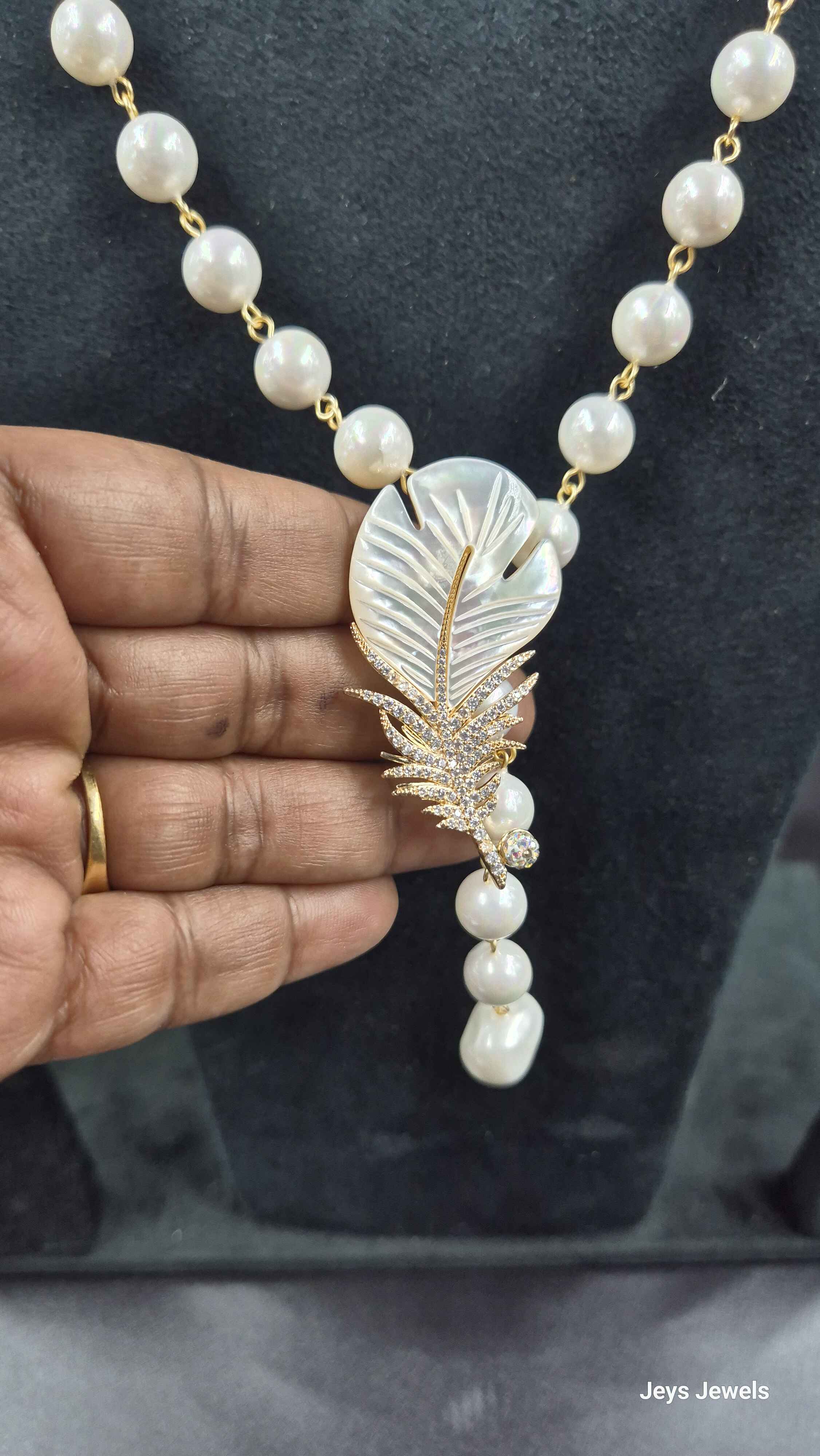 Elegant White Pearl Feather Necklace Set | Designer Pearl Jewellery