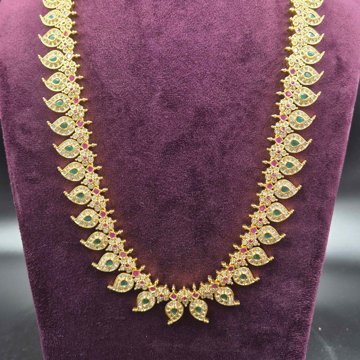 Leaf Design Long Haram  with green,red and white AD stones  with Earrings | Designer Bridal Jeweller