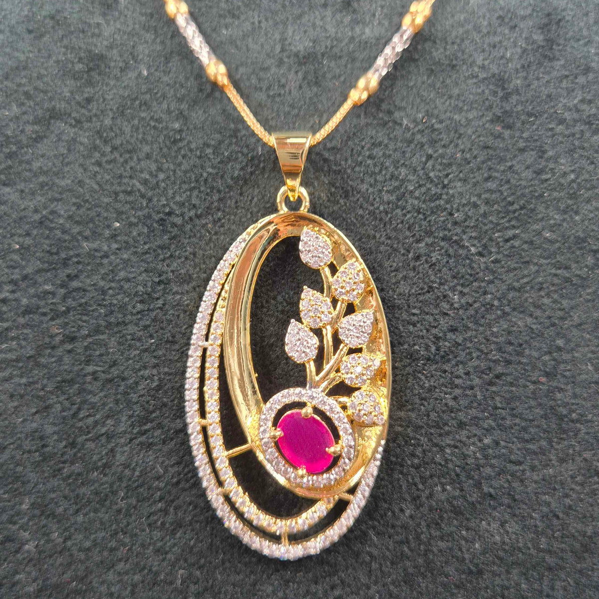 Oval Shaped CZ Pendant Necklace Set with Ruby & Matching Earrings | Designer Jewellery
