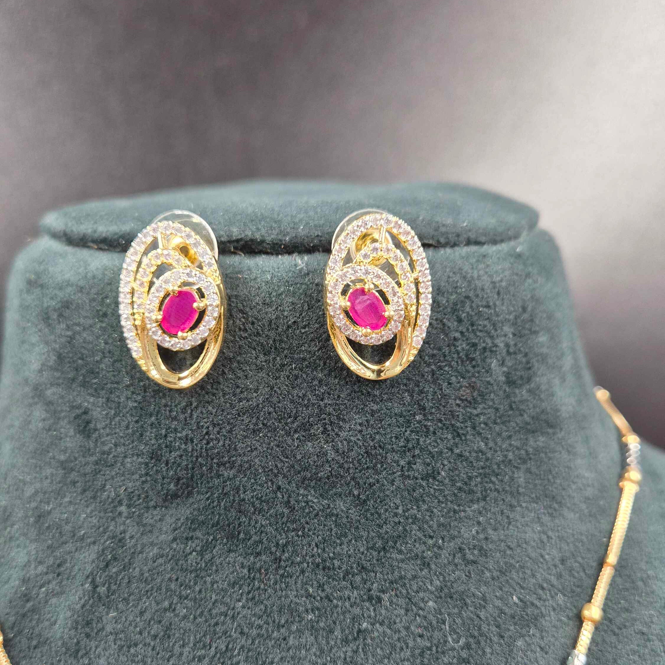 Oval Shaped CZ Pendant Necklace Set with Ruby & Matching Earrings | Designer Jewellery