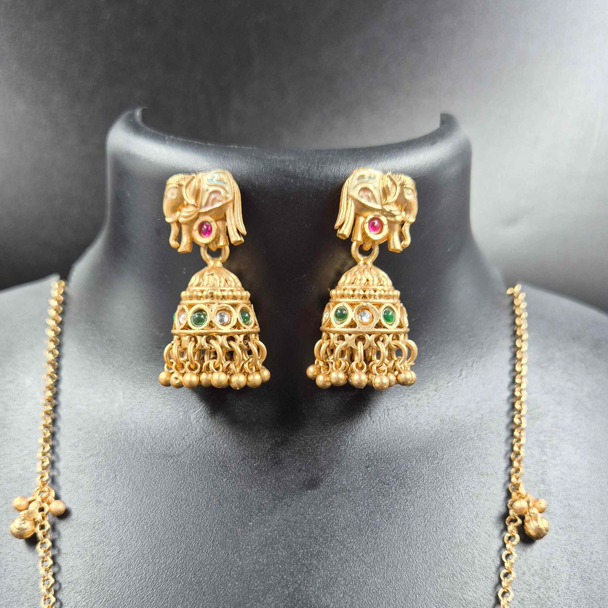 Baby and mother elephants under tree pendant in long chain