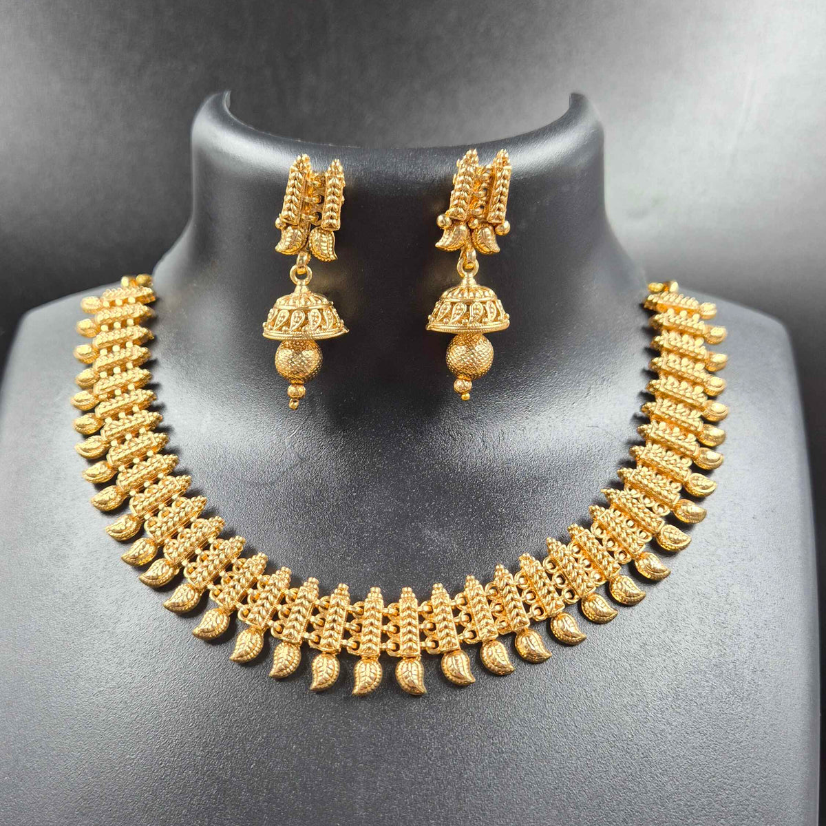 Traditional Gold Leaf Design Necklace with Jhumka Earrings
