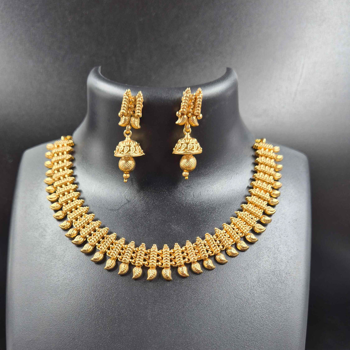 Traditional Gold Leaf Design Necklace with Jhumka Earrings
