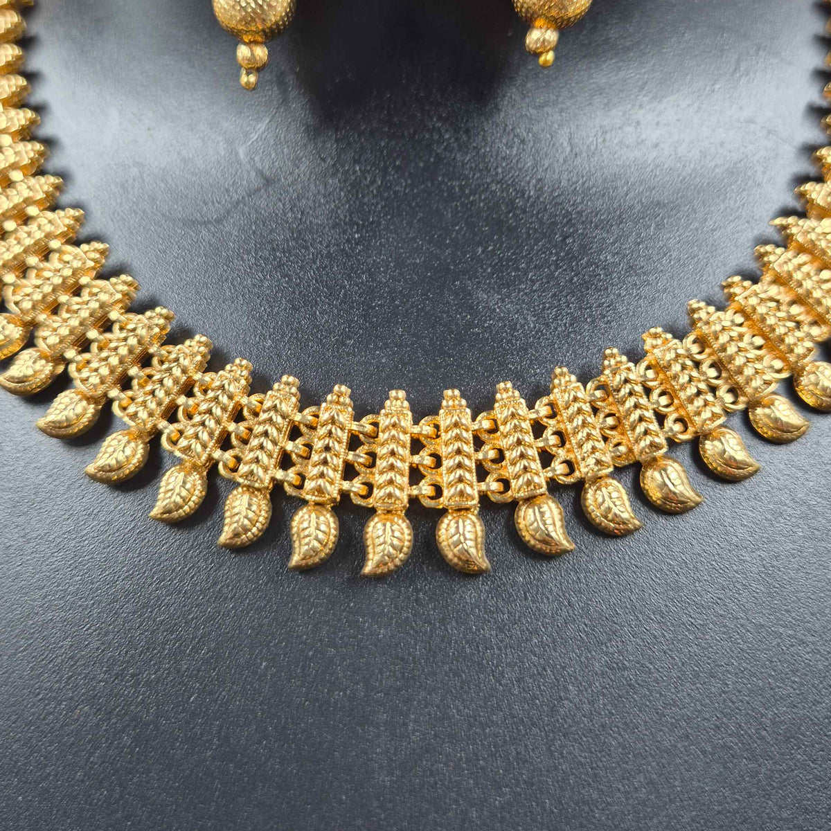 Traditional Gold Leaf Design Necklace with Jhumka Earrings