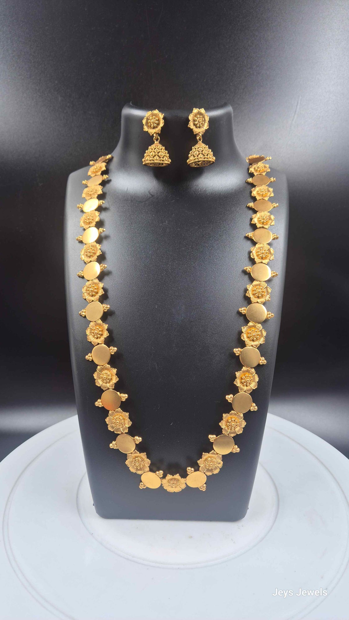 Gold Finish Floral Coin Necklace Set with Matching Jhumkas