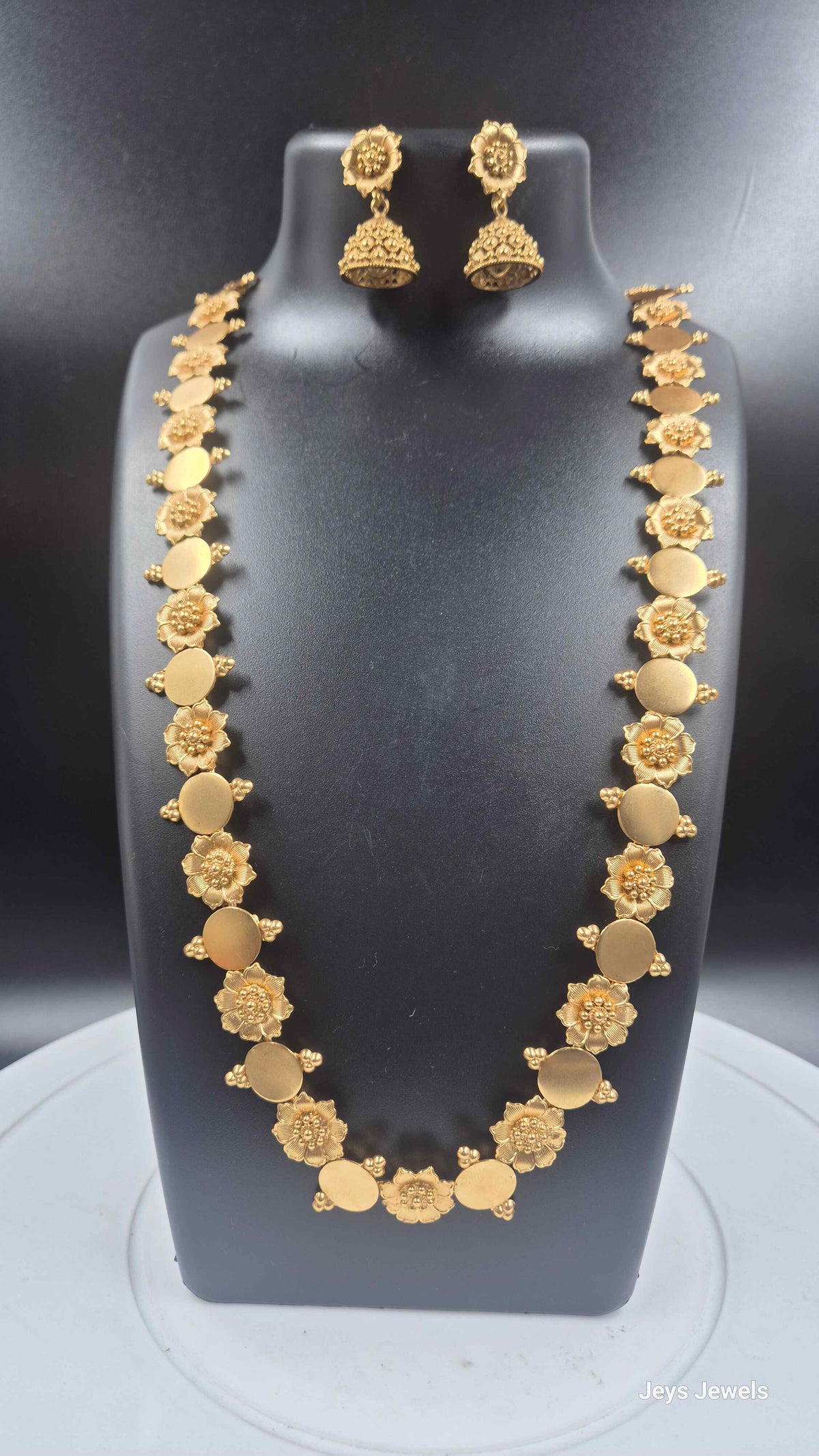 Gold Finish Floral Coin Necklace Set with Matching Jhumkas