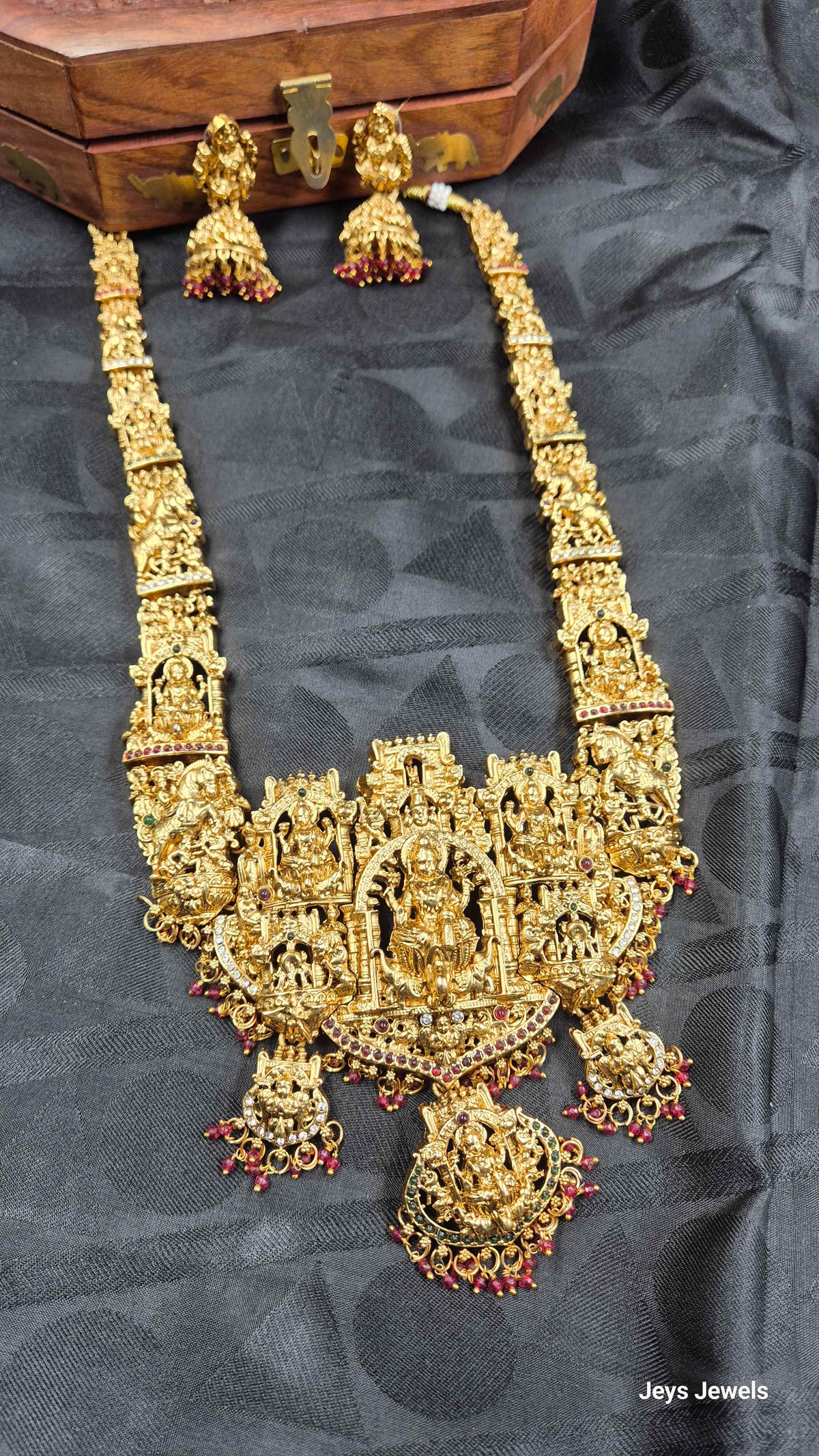 Grand Temple Jewellery Haram with Deity Motifs, red Stones & Earrings