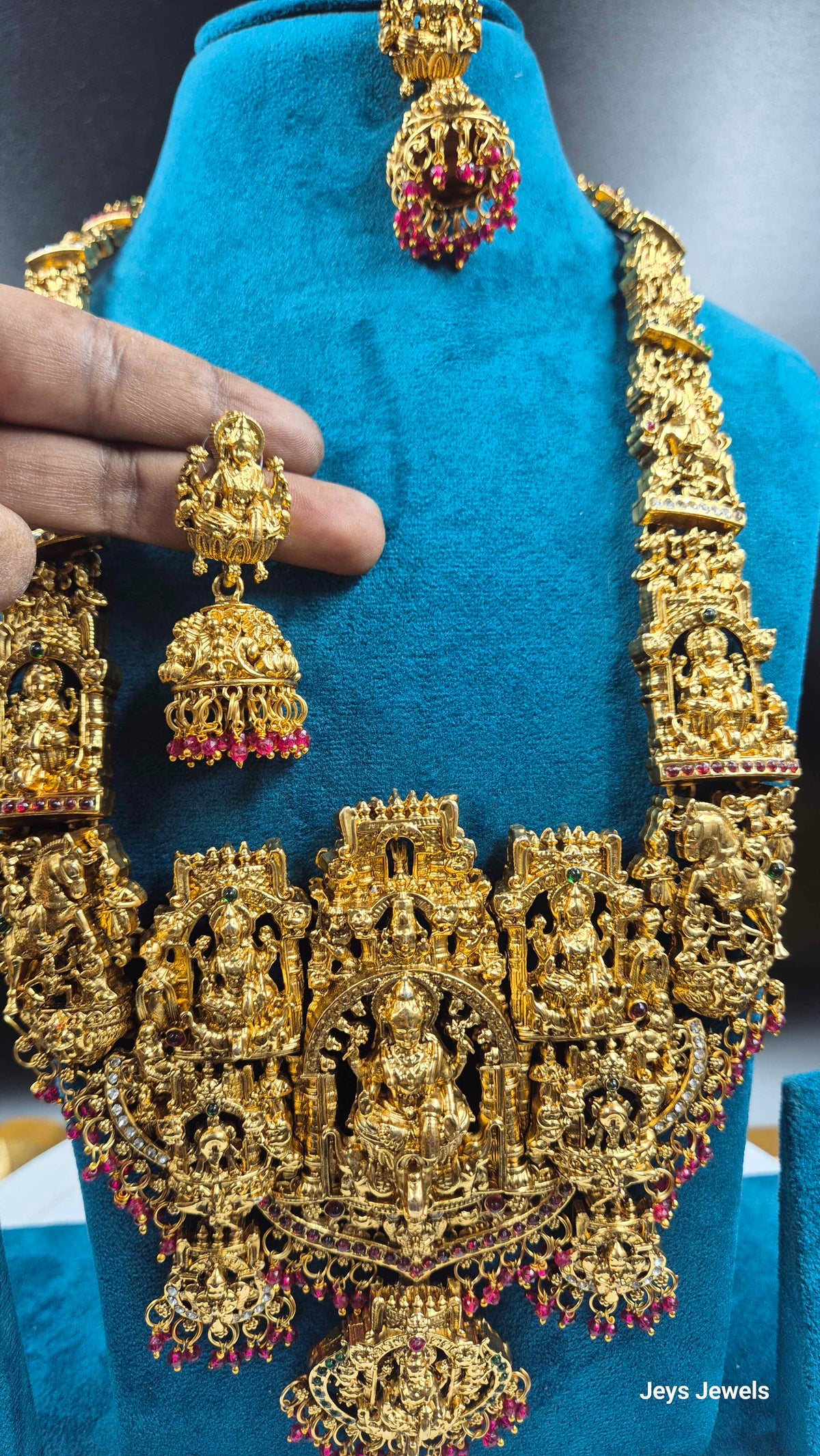 Grand Temple Jewellery Haram with Deity Motifs, red Stones & Earrings