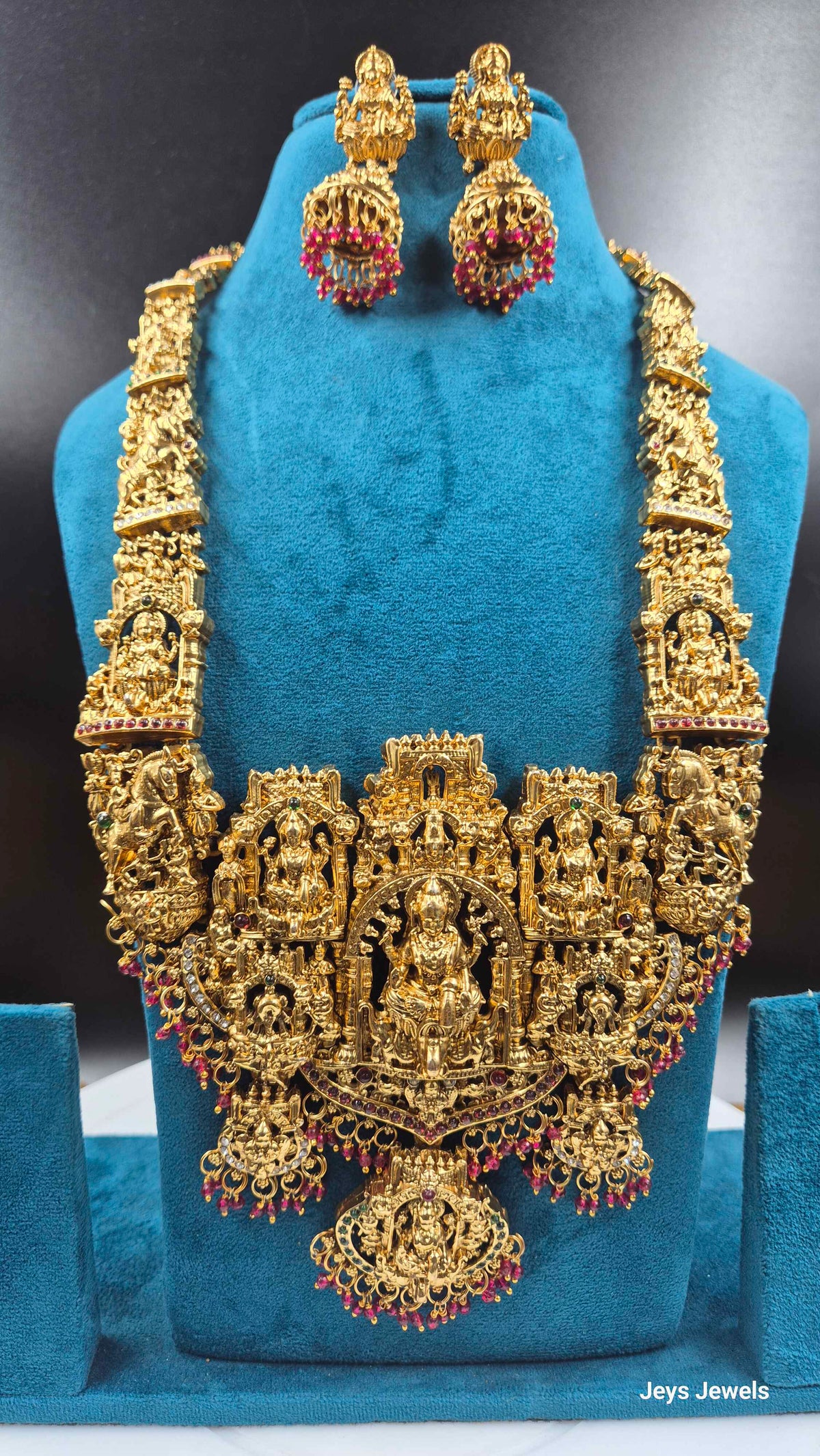 Grand Temple Jewellery Haram with Deity Motifs, red Stones & Earrings