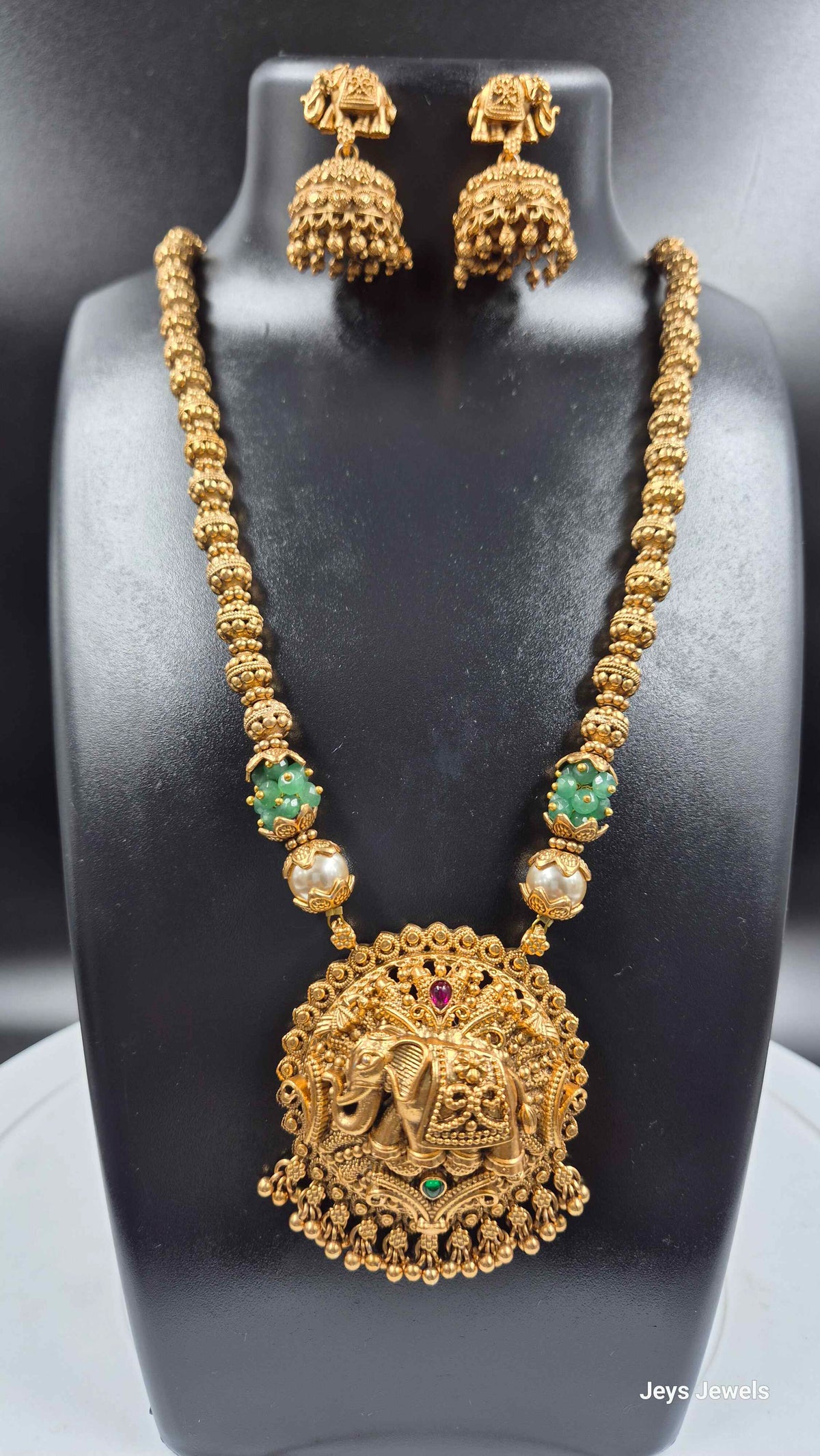 Round Elephant Dollar Pendant Necklace Set with Jhumkas