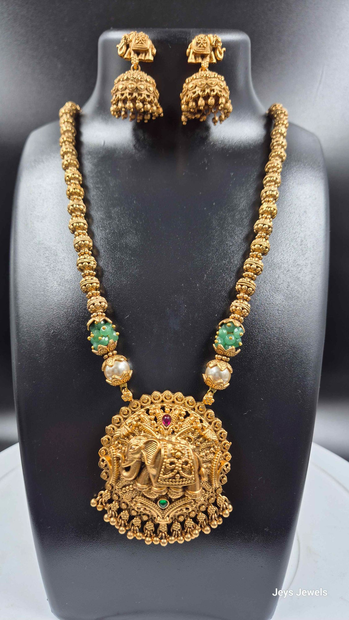 Round Elephant Dollar Pendant Necklace Set with Jhumkas