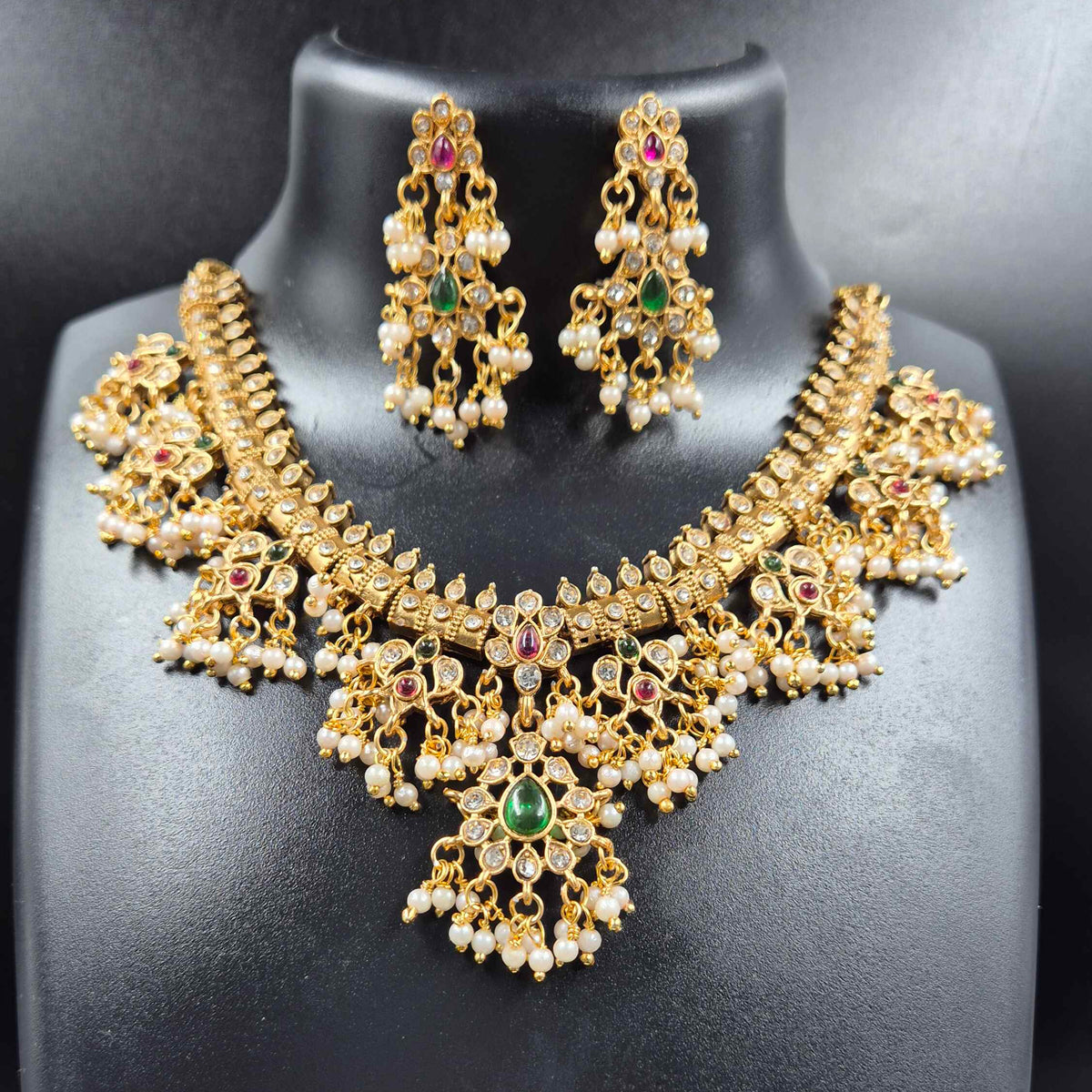 Simple Guttapusalu Necklace Set with Green and Ruby Stones