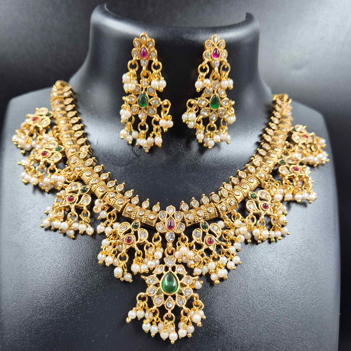Simple Guttapusalu Necklace Set with Green and Ruby Stones