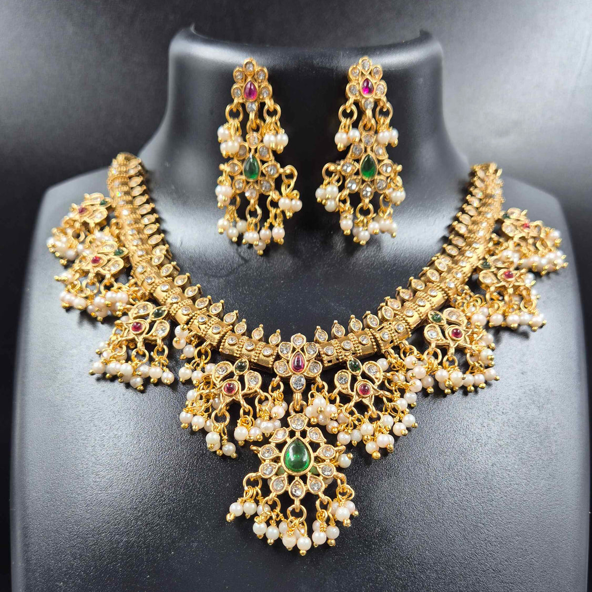Simple Guttapusalu Necklace Set with Green and Ruby Stones