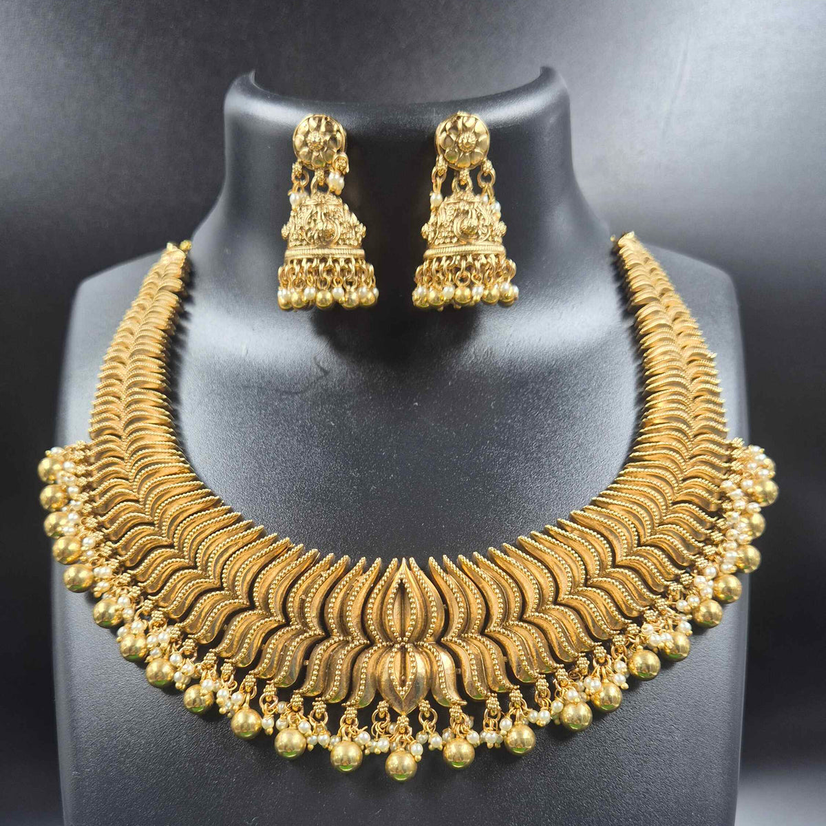 Lotus gold finish necklace