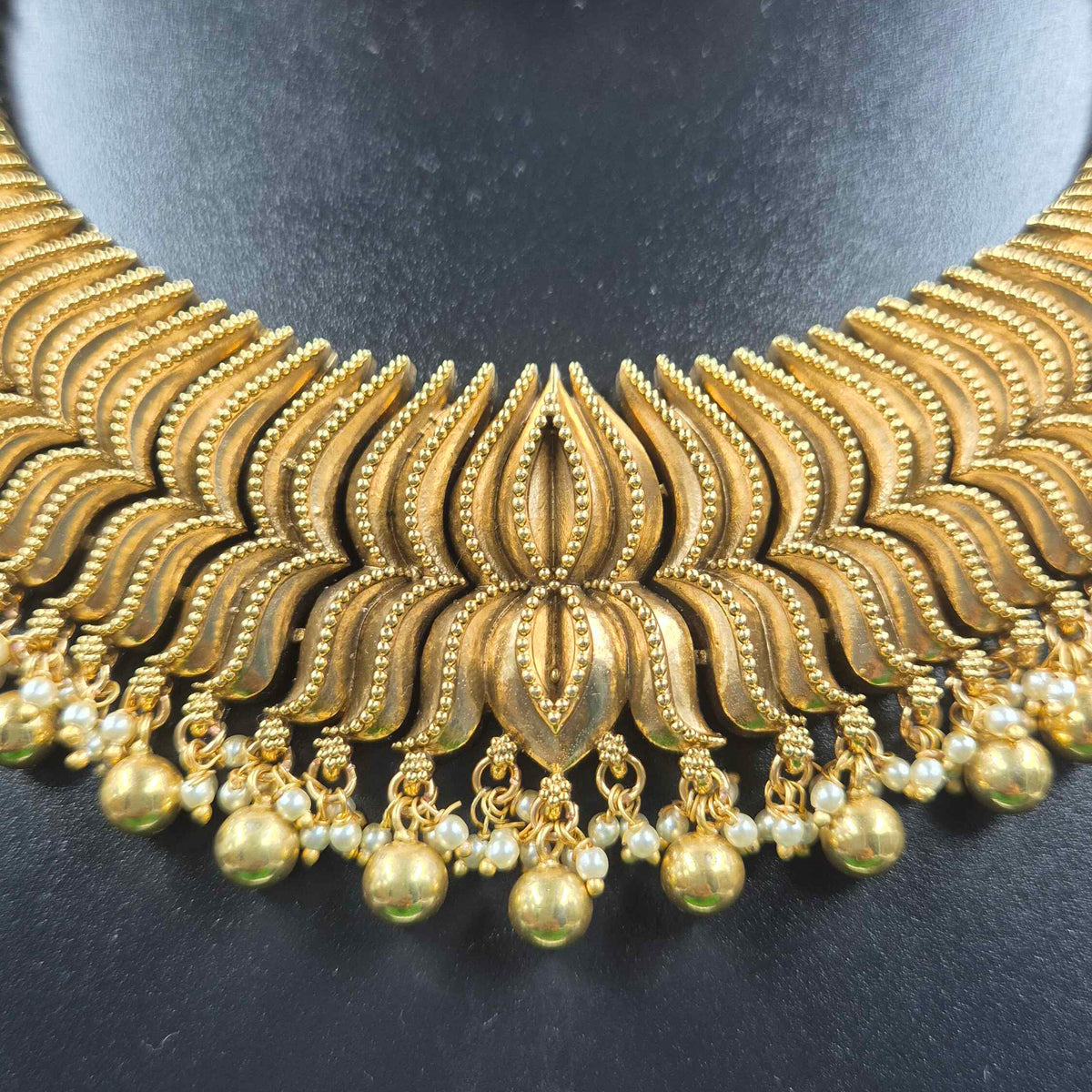 Lotus gold finish necklace
