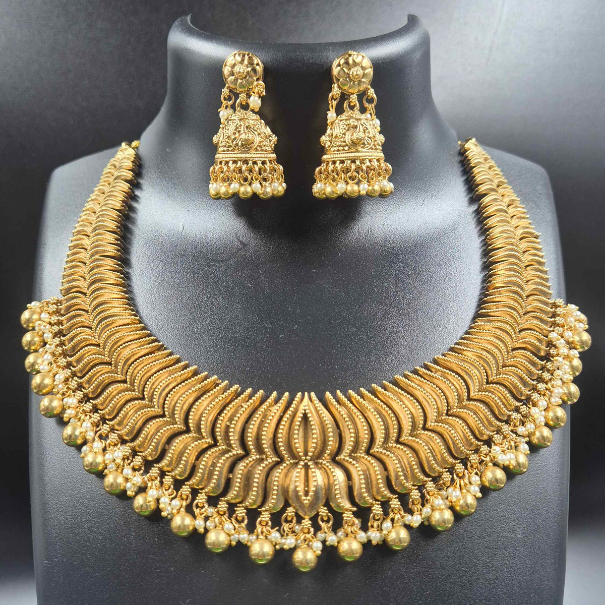 Lotus gold finish necklace