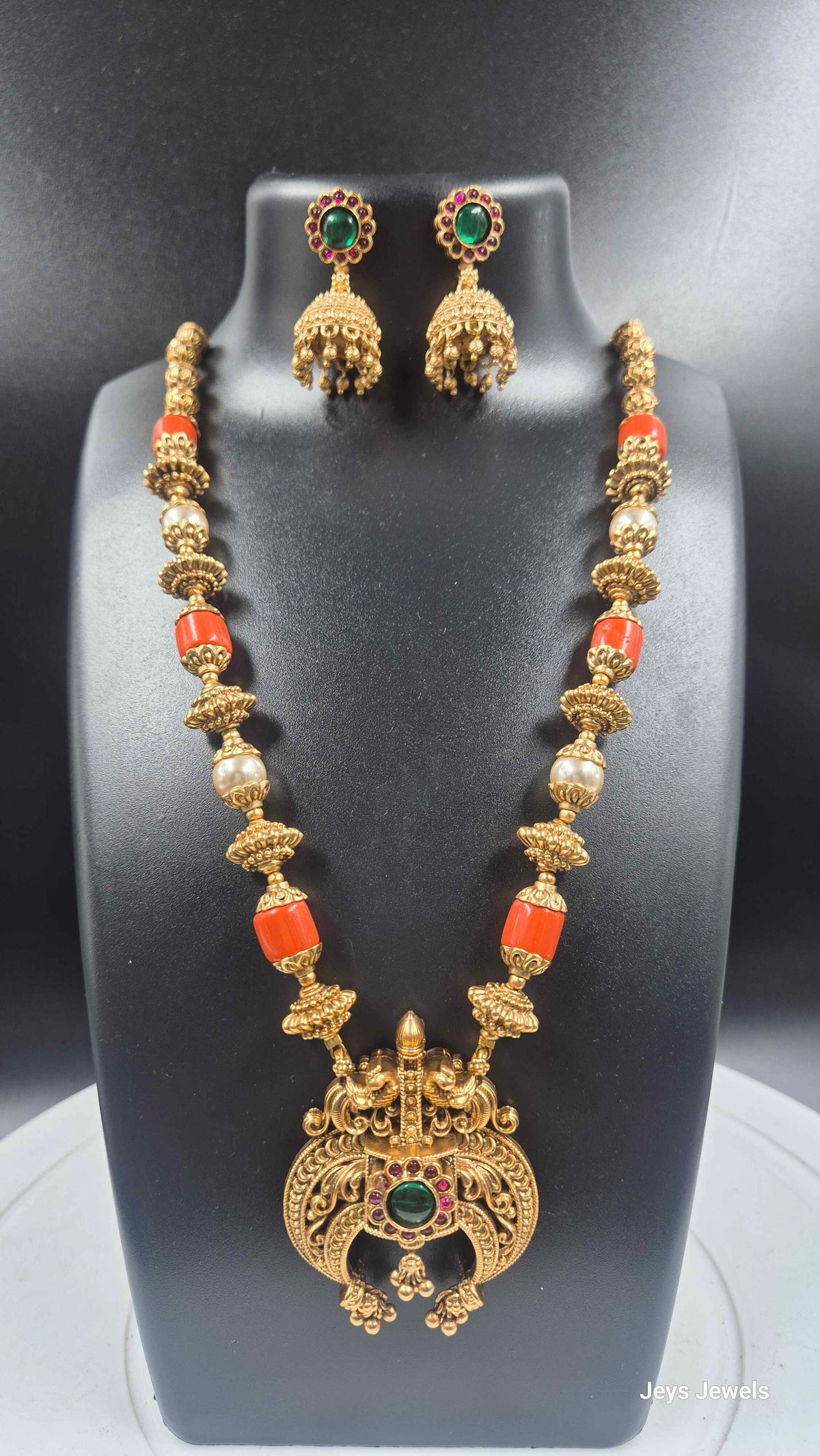 Gold Finish Haram with orange corals and Green Stones