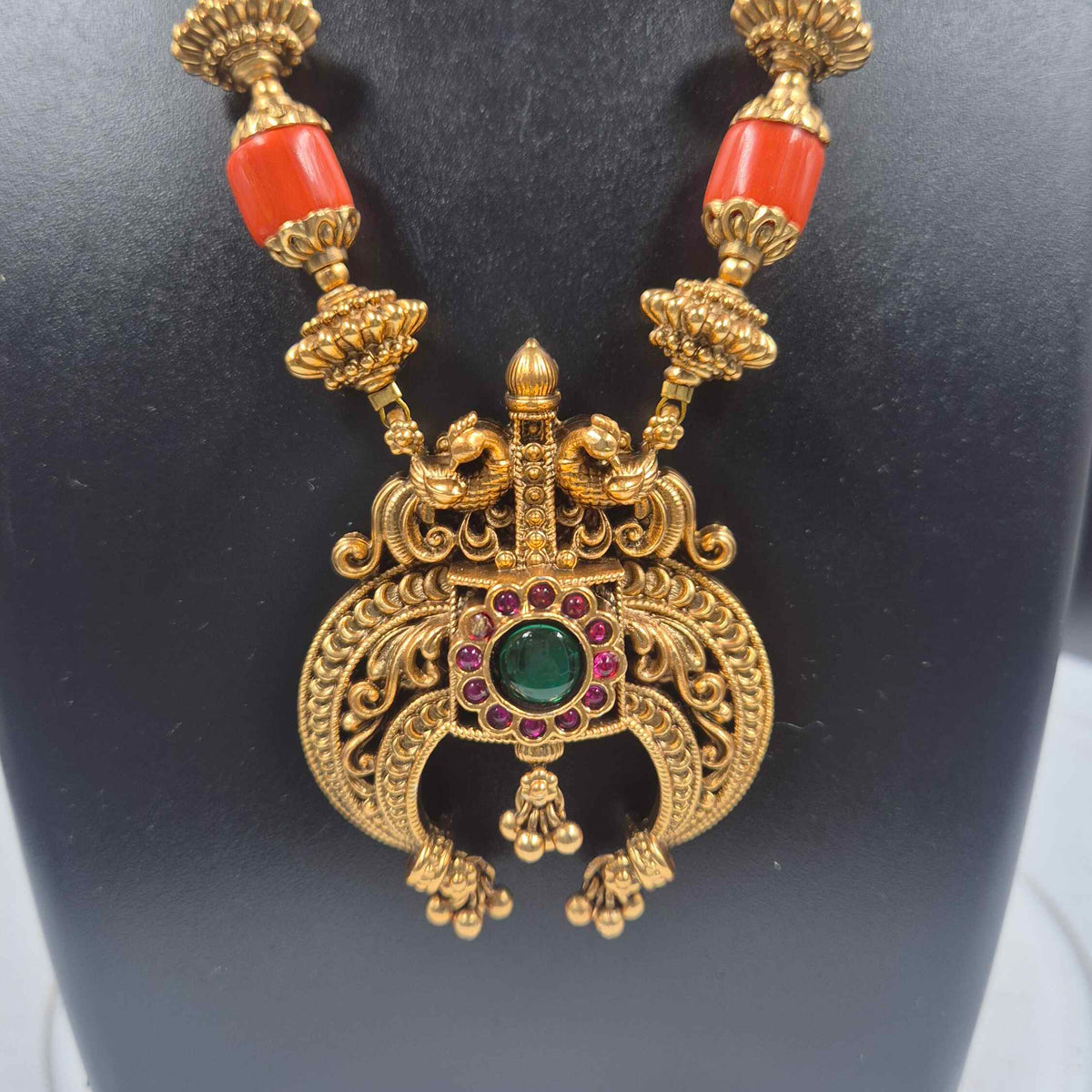 Gold Finish Haram with orange corals and Green Stones