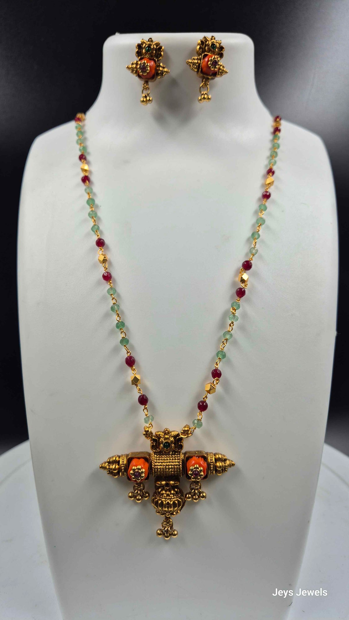Orange coral pendant Set with Red Green Beads