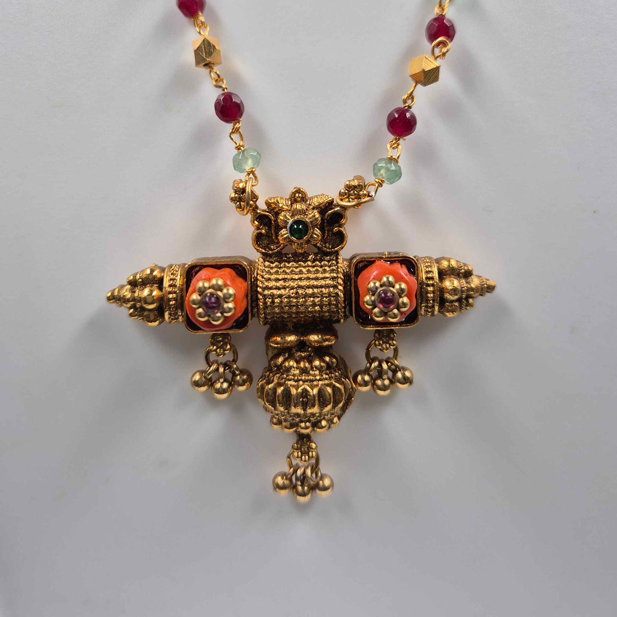 Orange coral pendant Set with Red Green Beads