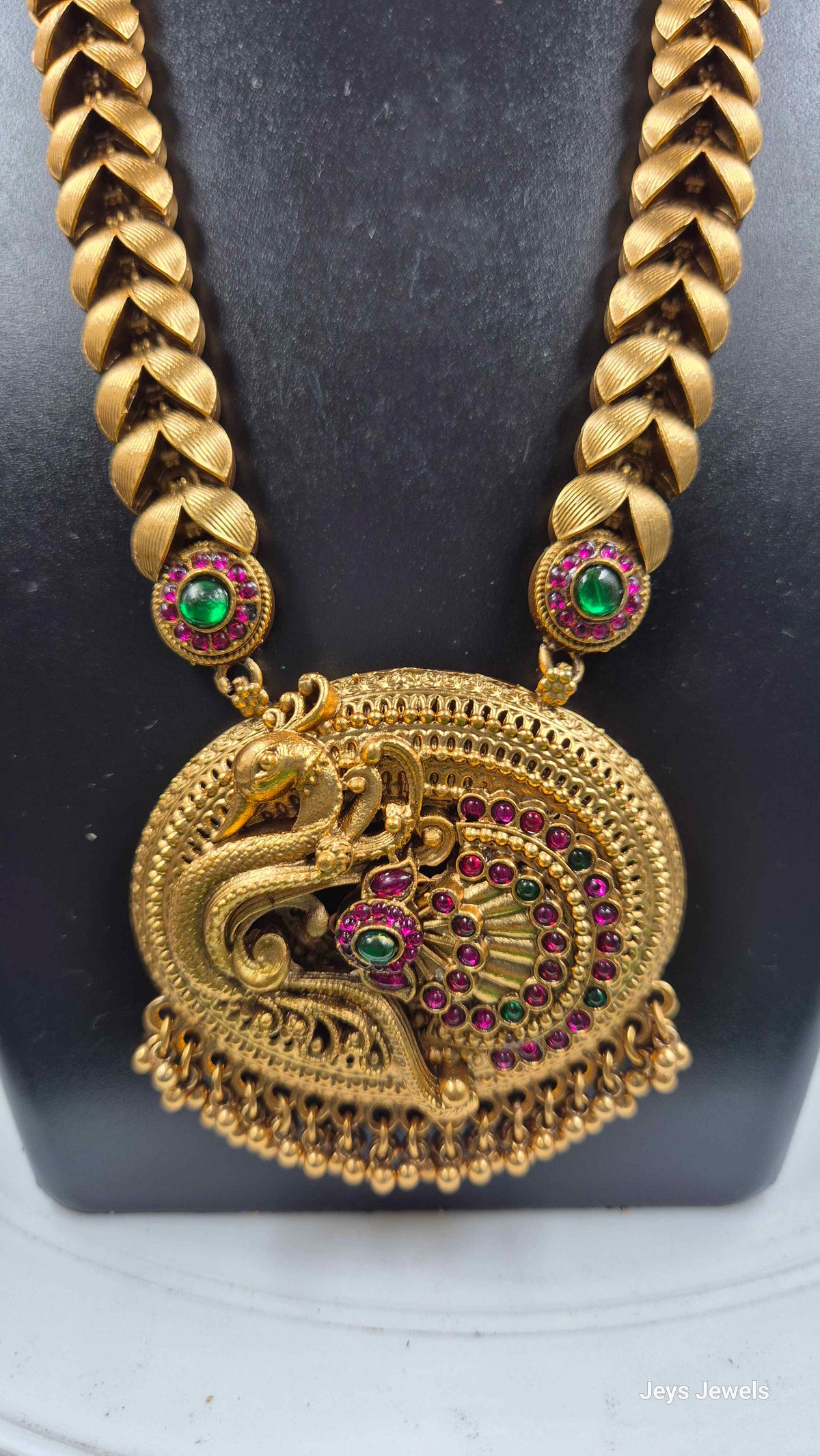 Non-Idol Peacock set with Ruby Green Stones