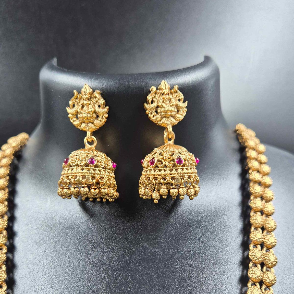 Gajalakshmi haram Set with Green Stones and Jhumkas