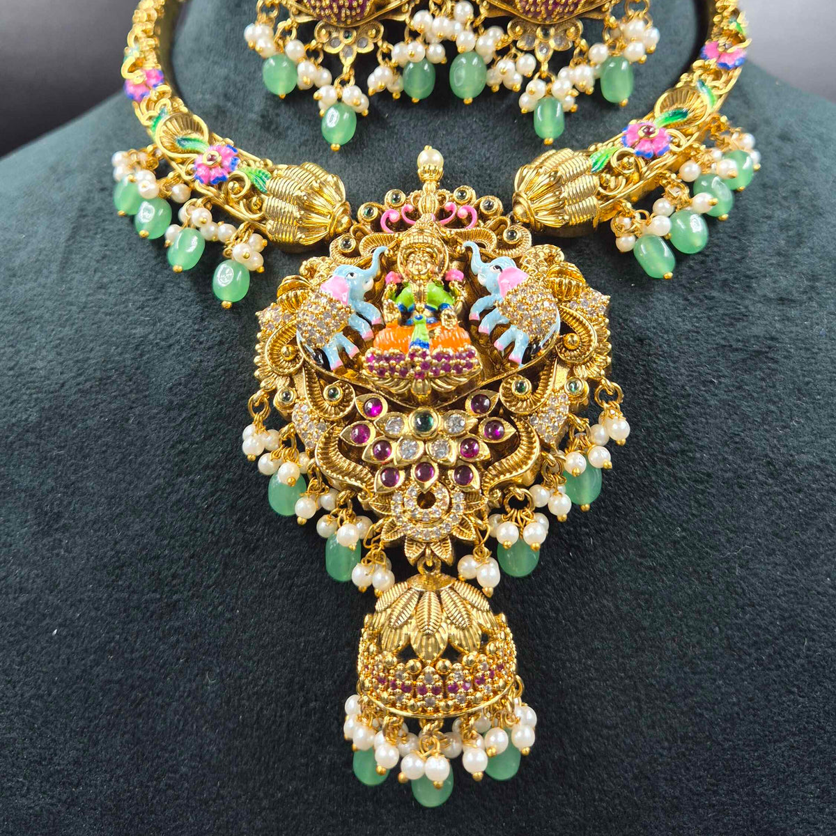Gajalakshmi necklace with half jhumka hanging pendant