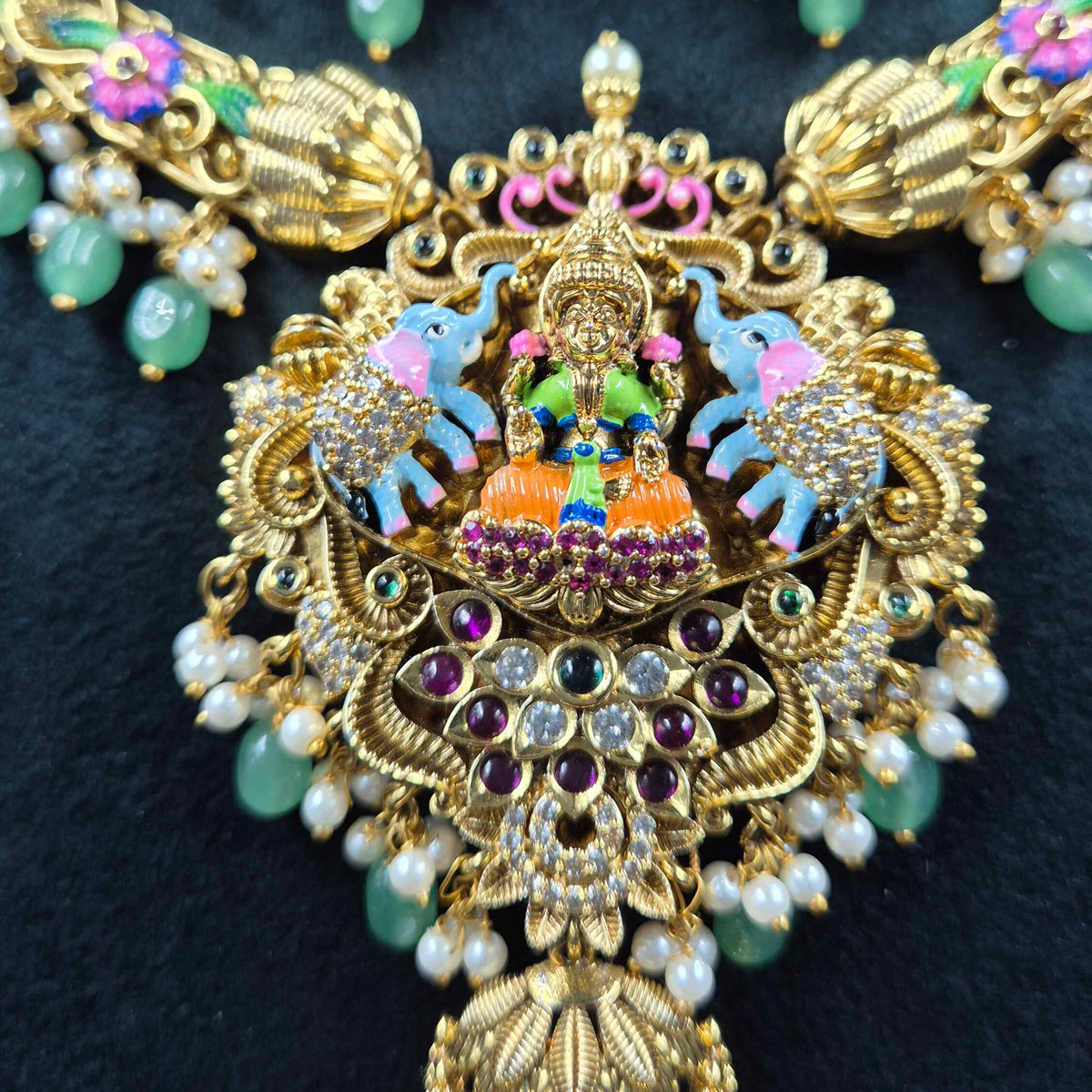 Gajalakshmi necklace with half jhumka hanging pendant