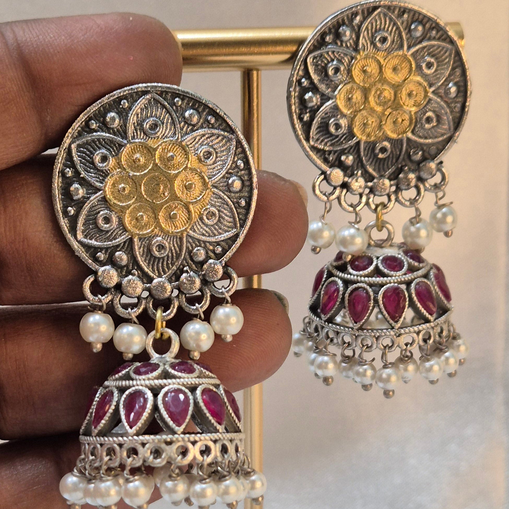 Big Jhumka In Dual Tone With Red Stones